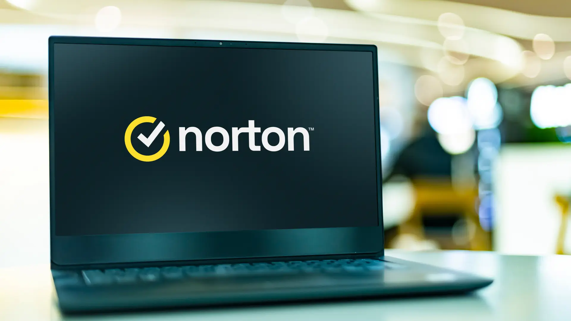 Laptop screen with Norton logo that is the virus protect BT brings his clients
