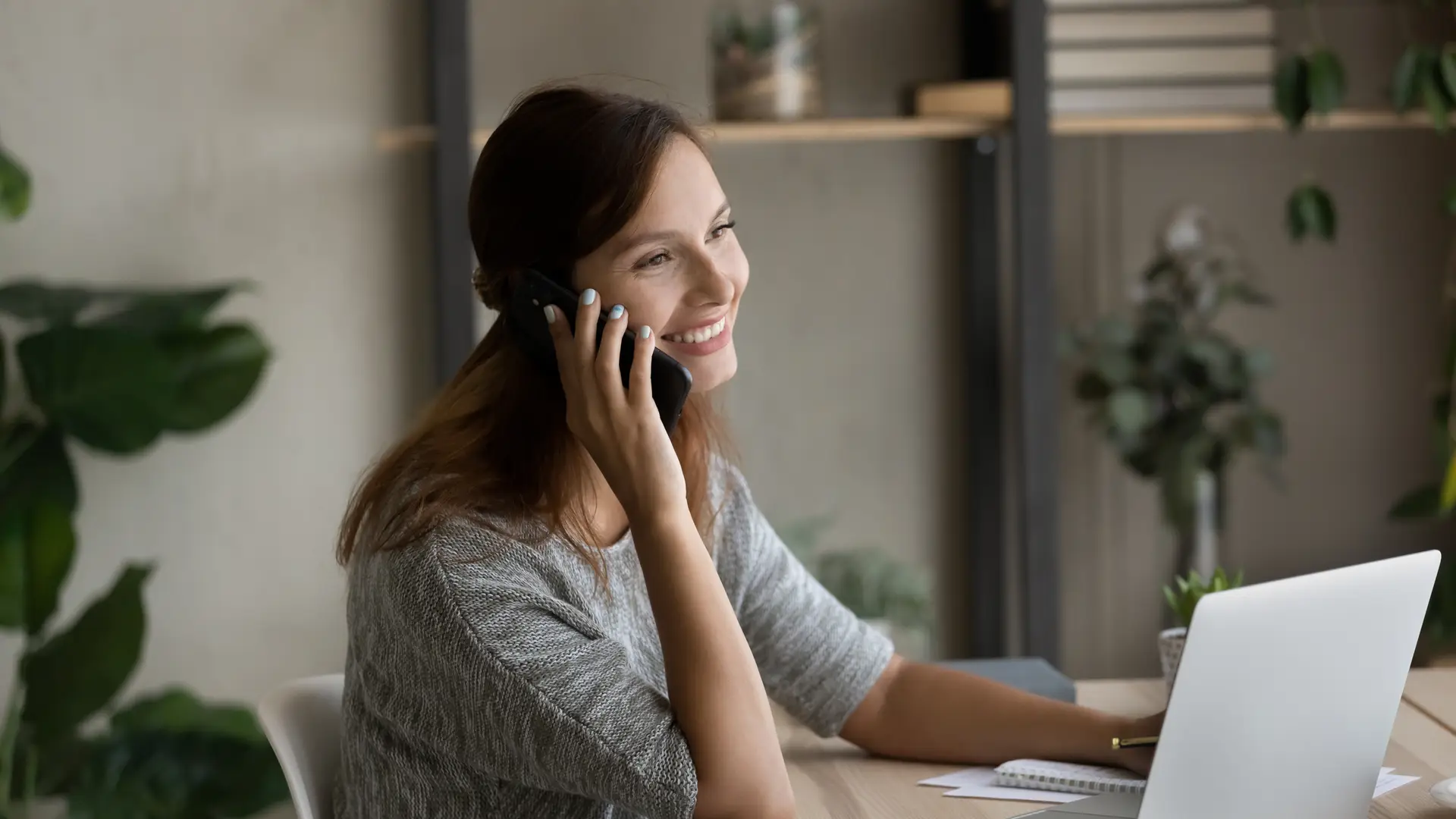 Girl using her telephone thankful BT network