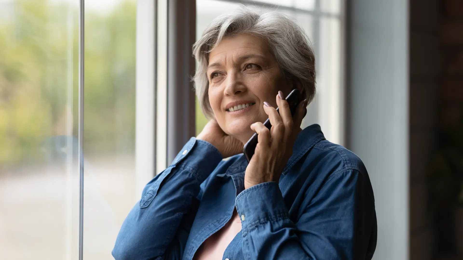 Women talking on his phone with Glide customer service