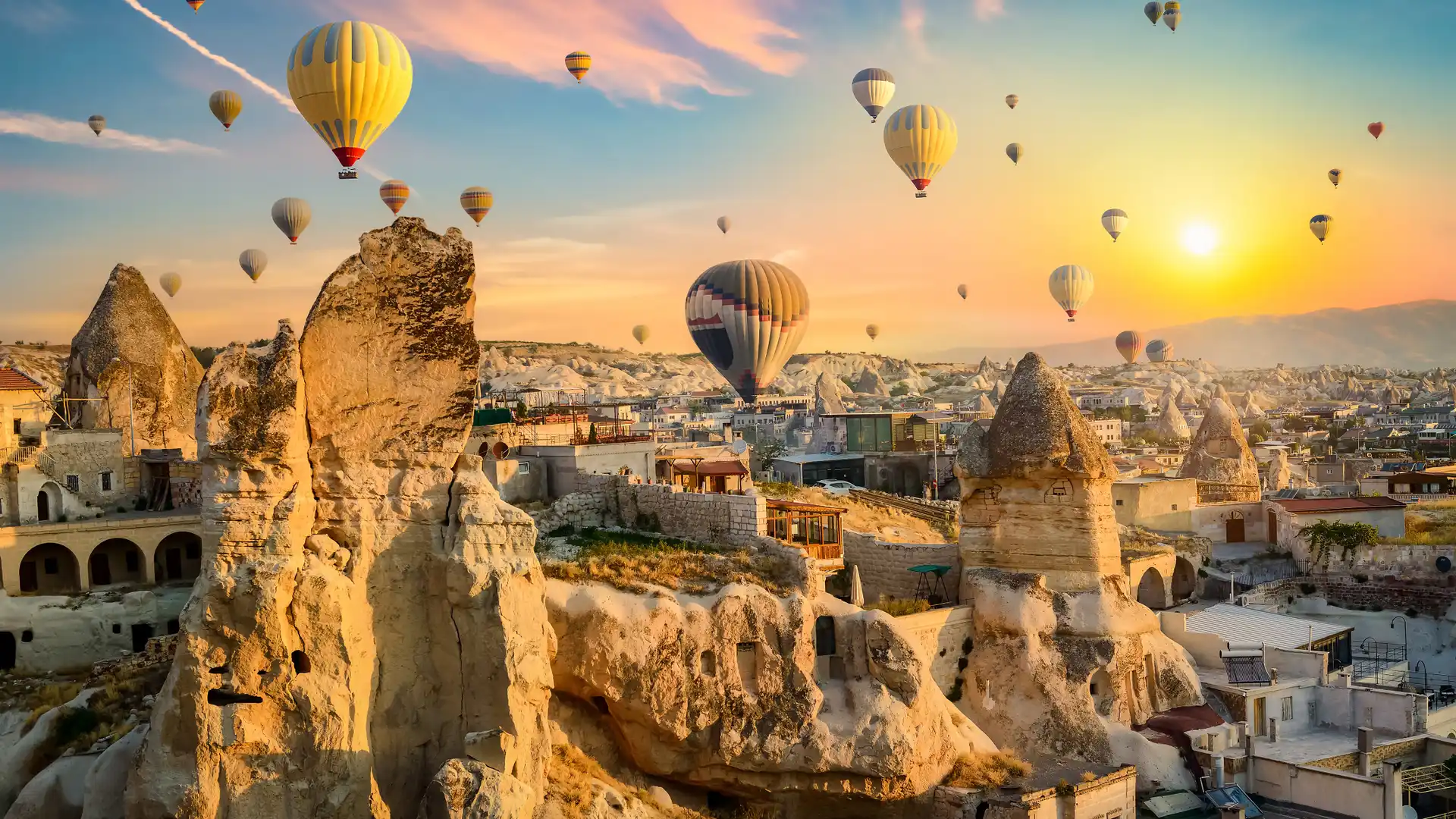 Tourists enjoying the hot air ballons in Turkey because the have hired roaming in this country