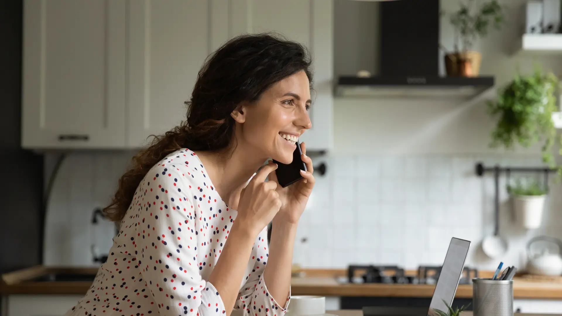 Woman talking on his phone with Hyperoptic customer service